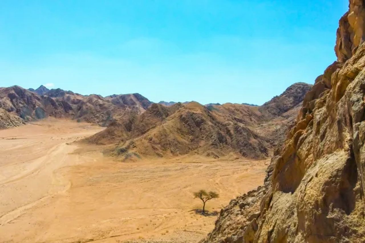 Rocky wadi and desert valley with mountains near Marsa Alam