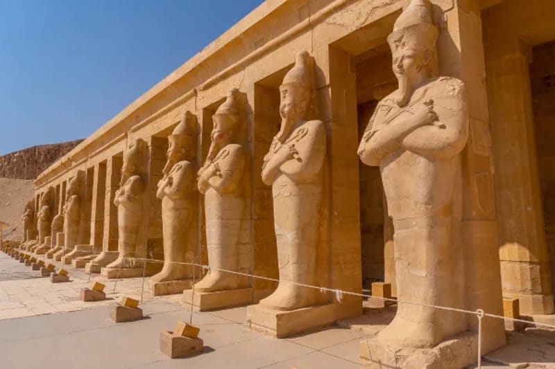 Row of Osiris statues along the colonnade of Hatshepsut temple